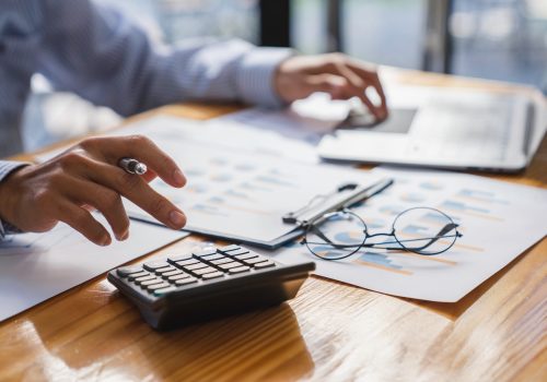 Business analyst team checking in financial statement for audit internal control system. Accounting